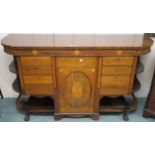 A Victorian inlaid mahogany sideboard with central door flanked by two pairs of four drawers and