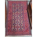 A Balouch rug with geometric designs, 158cm x 97cm Condition Report: Available upon request