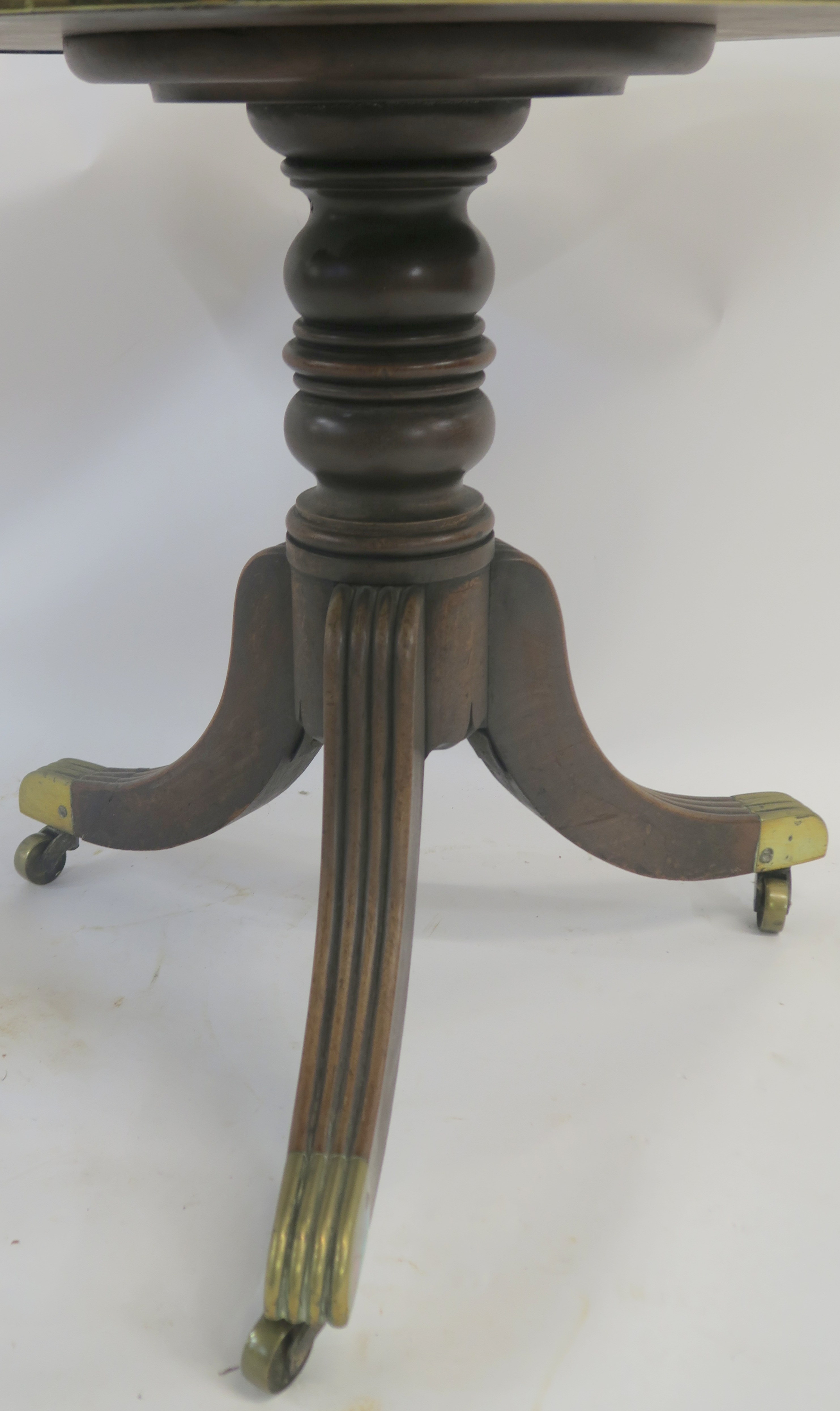 A Victorian mahogany circular table with brass frame on a turned baluster support on tripod base - Image 3 of 3