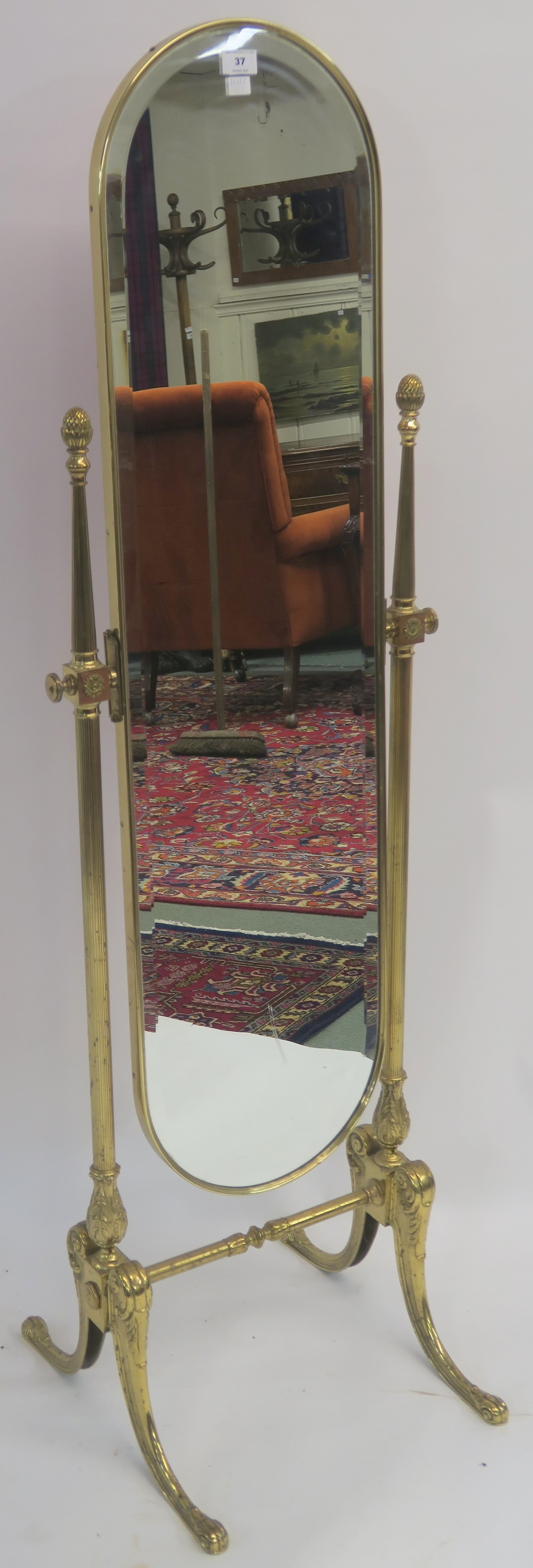 A brass cheval mirror, 153cm high Condition Report: Available upon request