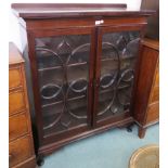 A mahogany bookcase with two glazed doors, 129cm high x 105cm wide x 37cm deep Condition Report: