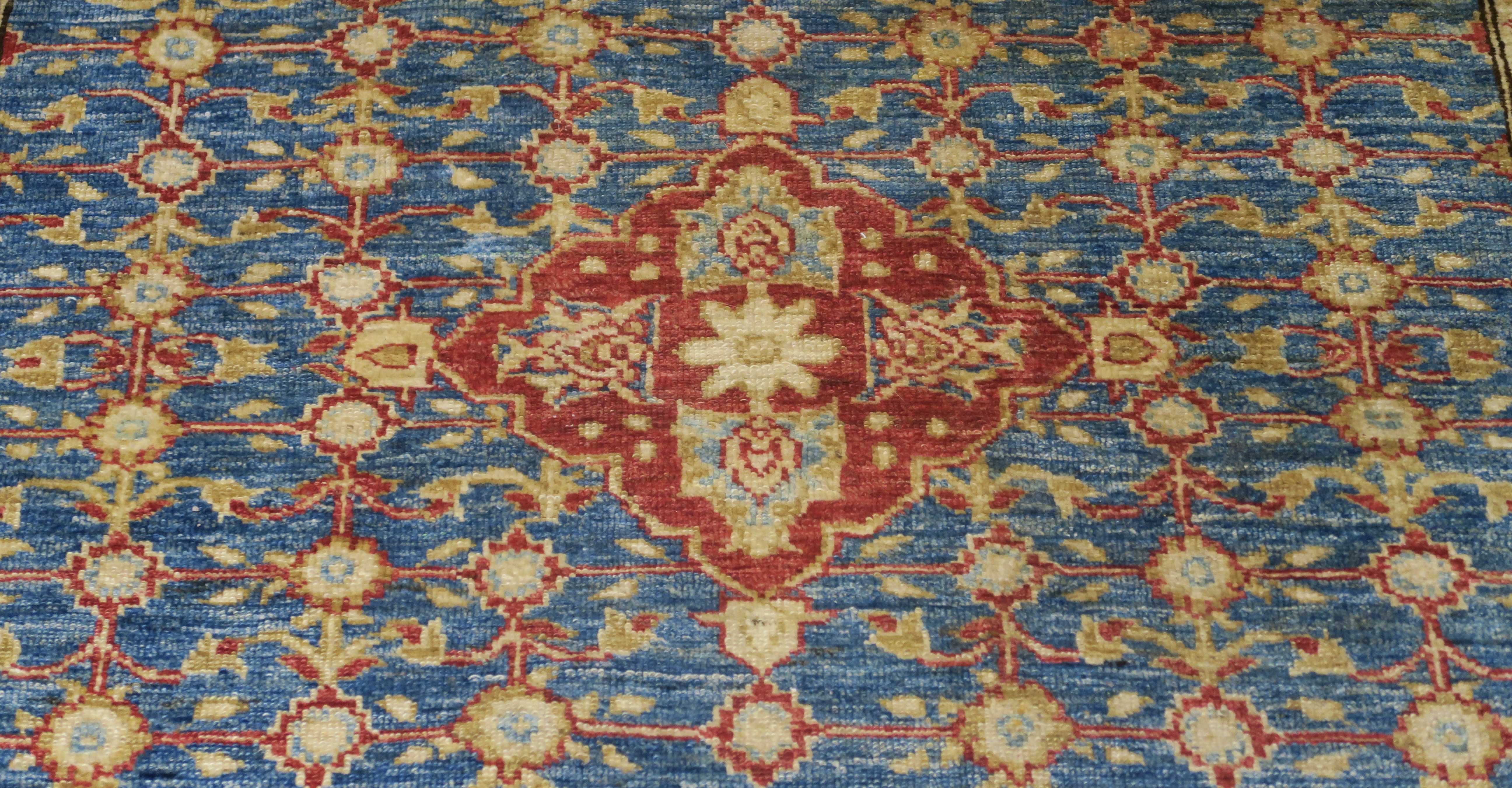 A blue ground eastern rug with central medallion and allover floral design, 187cm x 125cm - Image 2 of 4