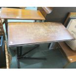 An Adjustable bed table with cast iron base and a mahogany side table (2) Condition Report: