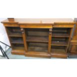 A Victorian walnut open break front bookcase, 94cm high x 153cm wide x 38cm deep Condition Report:
