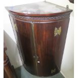 A Georgian mahogany corner cabinet with brass hinges, 108cm high x 71cm wide x 44cm deep Condition