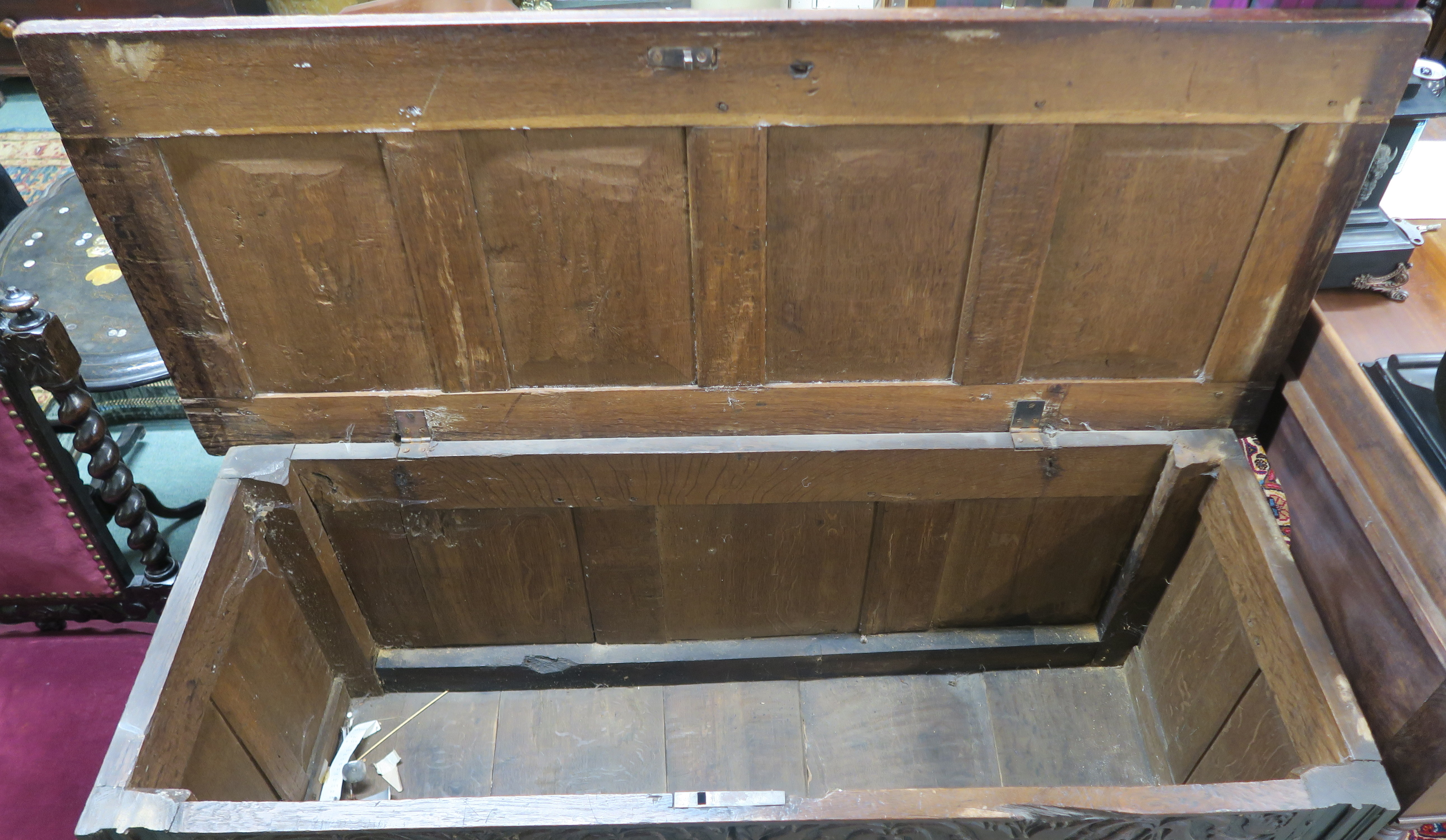 An 18th Century oak panelled coffer with carved frieze, 72cm high x 139cm wide x 56cm deep Condition - Image 4 of 5