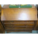 A Georgian mahogany bureau with fitted interior and four graduating drawers, 100cm high x 104cm wide