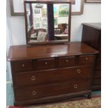 A Stag Minstrel dressing table with mirror, 127cm high x 107cm wide x 46cm deep Condition Report: