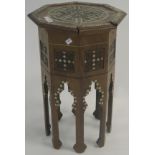 An octagonal Moorish occasional table inlaid with bone and mother of pearl, 59cm high, 37cm wide and
