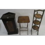 A lot comprising a mahogany bedside cabinet, a poker work folding table and a painted three tier