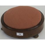 A Victorian oak framed upholstered circular stool. Condition Report: Available upon request