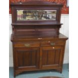 A Victorian oak mirror back sideboard with two drawers above two cabinet doors, 166cm high, 120cm