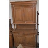 A 20th century pine kitchen cabinet, 233cm high, 120cm wide and 47cm deep Condition Report: