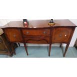 A 20th century serpentine front sideboard with two central drawers flanked by two doors on