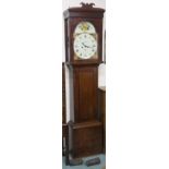 A Victorian mahogany cased longcase clock with painted face with Roman numerals. 213cm high.