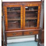 A Victorian mahogany bookcase with glazed doors. 141cm high, 108cm wide and 34cm deep. Condition
