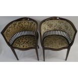 A pair of Edwardian mahogany upholstered tub chairs and a pair of mahogany bedroom chairs (4)