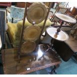 A modern mahogany coffee table, three tier folding cake stand,two tier wine table and a tea