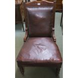 A Victorian mahogany nursing chair with rexine upholstery Condition Report: Available upon request