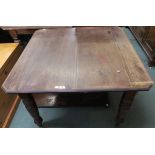 A Victorian mahogany wind out dining table with single spare leaf, 72cm high, 104cm high and 106cm