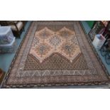 A Tunisian beige ground geometric pattern rug, 350cm long and 260cm wide Condition Report: Available