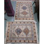 Pair of Persian cream ground rugs 108cm long x 81cm wide (2) Condition Report: Available upon