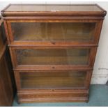 A 20th century oak three tier glazed sectional bookcase 115cm high x 87cm wide x 28cm deep Condition