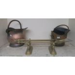 Two helmet coal buckets and brass fire tools (7) Condition Report: Available upon request