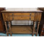 An early 20th century oak two drawer canteen buffet, 77cm high x 93cm wide x 47cm deep Condition
