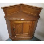 A 20th century oak single door corner cabinet, 100cm high x 89cm wide x 56cm deep Condition