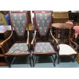 Two 20th century beech framed high back armchairs, 119cm high, and an Edwardian mahogany framed