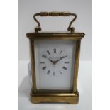 A Matthew Norman brass and glass carriage clock Condition Report: Available upon request