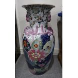 A large Chinese pottery jar with floral decoration, 81cm high Condition Report: Available upon