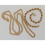 A 9ct gold curb chain necklace, length 57cm, together with a 9ct rope chain bracelet length 20cm,