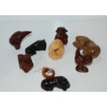 A small collection of modern carved netsuke animals Condition Report: Available upon request