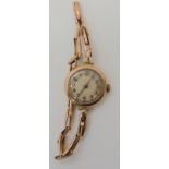 A 9ct gold ladies vintage watch and strap circa 1928 Glasgow import marks, weight including