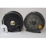 An Ogden Smith 3 3/8im fly reel with suede bag and a Charles Farlow 3 3/8in fly reel (2) Condition