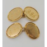 A pair of heavy weight 9ct gold cufflinks, with millennium hallmark, weight 18gms Condition