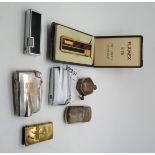 A lot comprising seven assorted cigarette lighters Condition Report: Available upon request