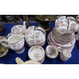 A Minton Cuckoo breakfast/dinner set comprising teapot, water jug, cake plate, four dinner, medium