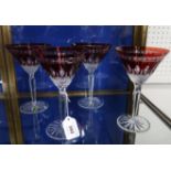 A set of four Waterford ruby flashed and cut champagne cocktail glasses Condition Report: