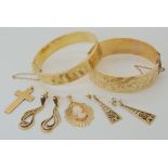 A collection of 9ct gold to include two pairs of earrings, a cross and a cameo pendant, weight