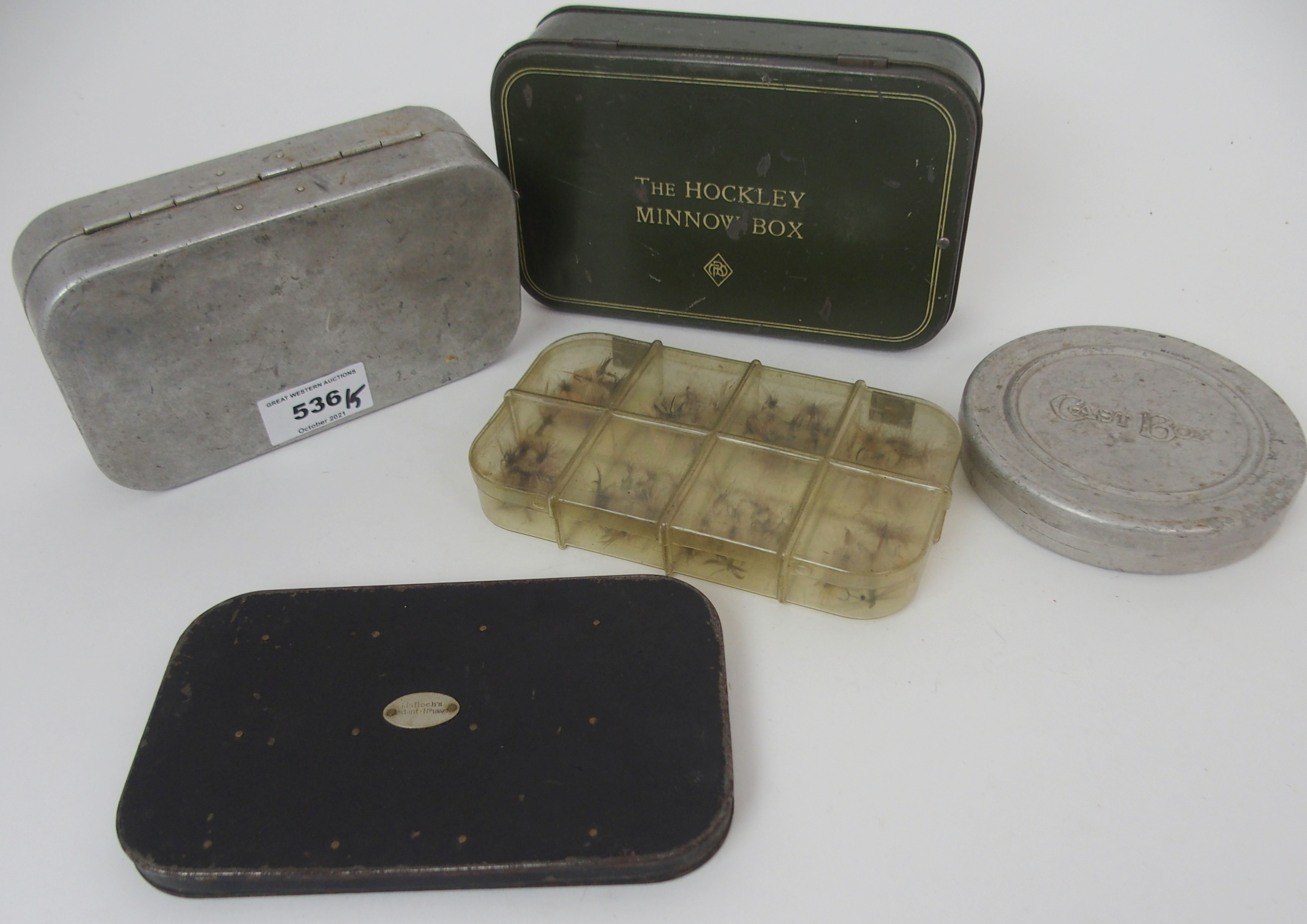 A Wheatley alloy fly case with spring loaded compartments with trout flies, Malloch's Patent