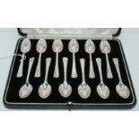 A cased set of twelve silver coffee spoons, London 1936 Condition Report: Available upon request