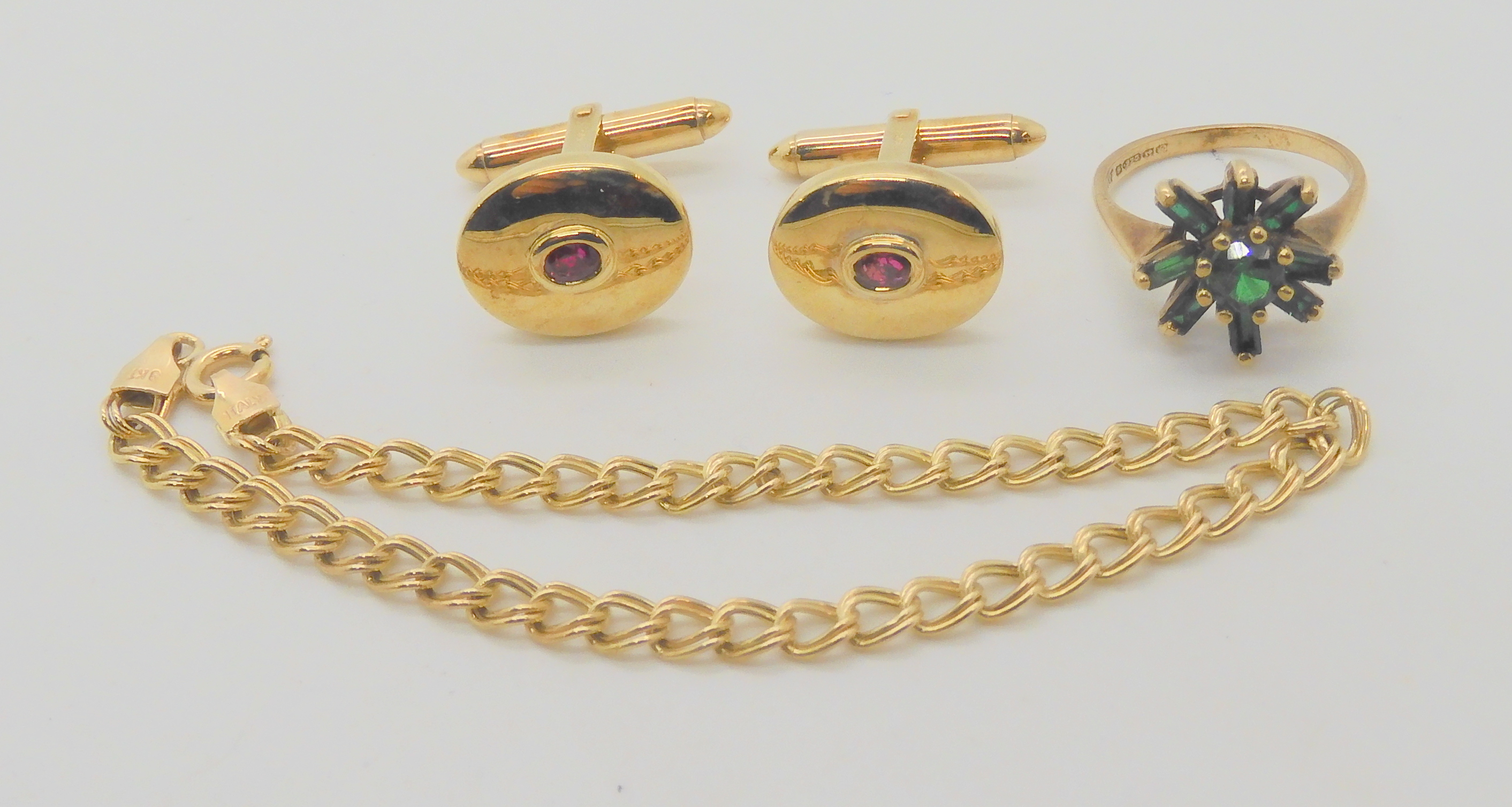 A pair of 9ct gold red gem set cufflinks, a green gem set ring, size P, and a double link chain