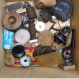 A box of various reels, line, bags etc (def) Condition Report: Available upon request