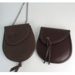 A Janet Eagleton MBE & Sons brown leather sporran, a Sporran-Nation brown leather sporran, a brown