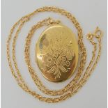 A 9ct locket and chain dimensions including bail 4.5cm x 2.7cm, length of chain 60cm, weight
