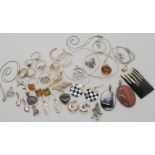 Silver mounted statement pendants, rings and other items Condition Report: Not available for this