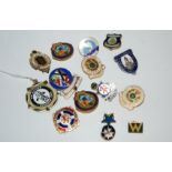 A collection of enamel lapel badges Condition Report: Available upon request